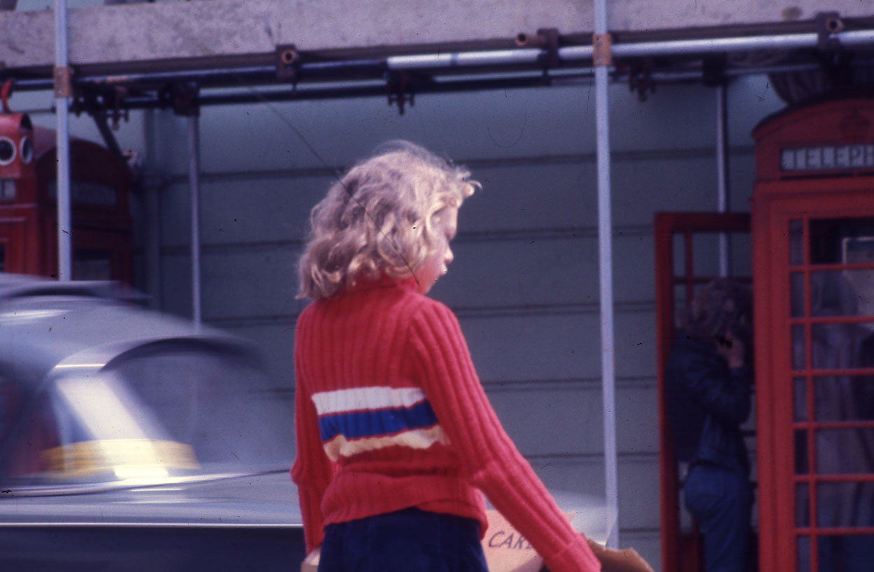 Woman in red sweater.